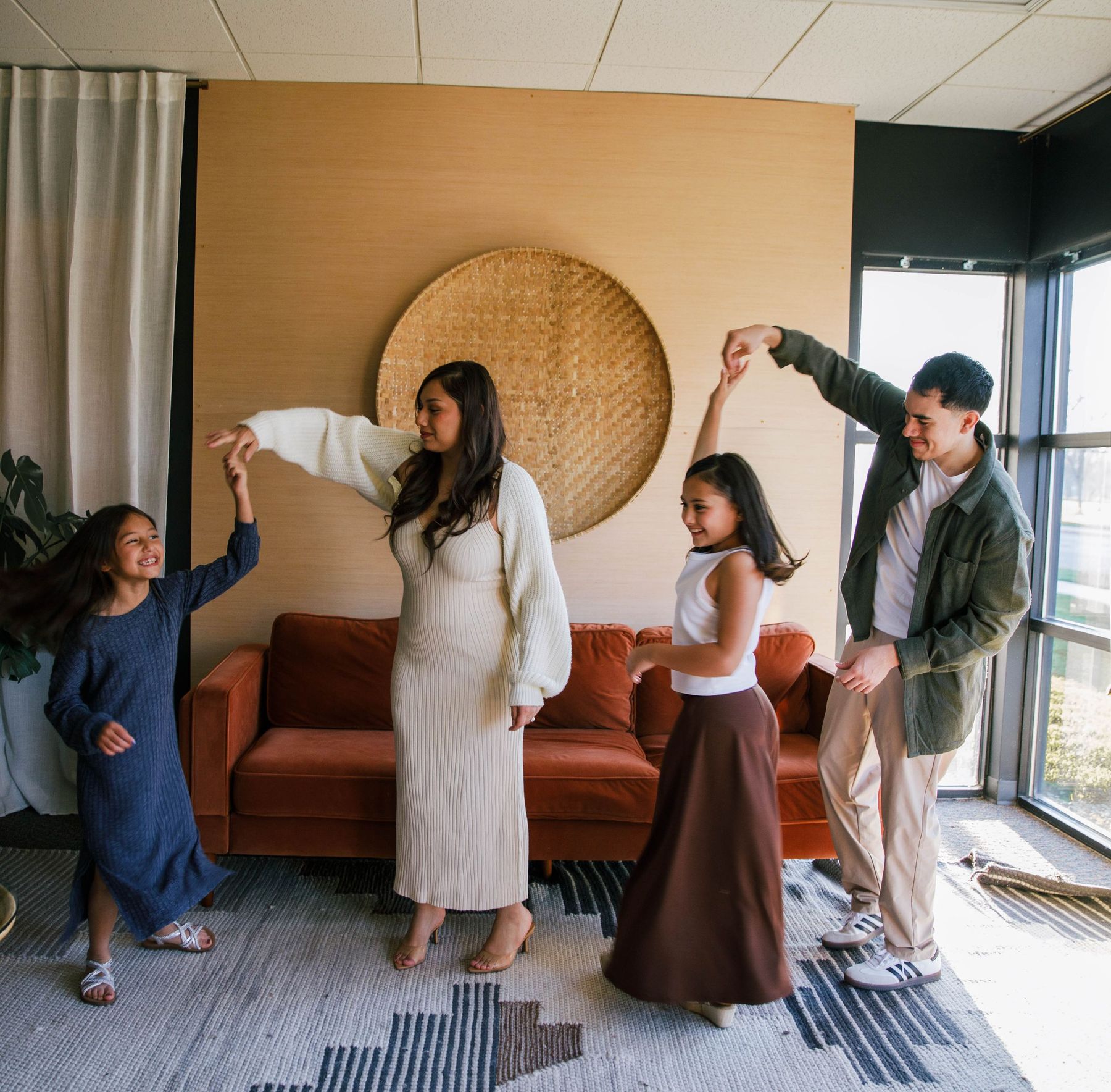 A family dance party in the living room