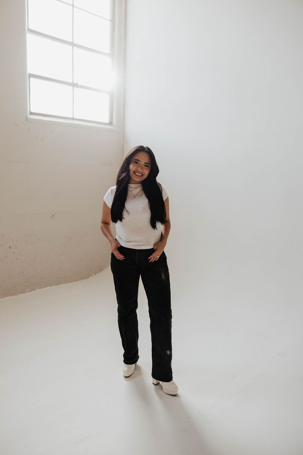 A clean studio branding portrait on a white backdrop