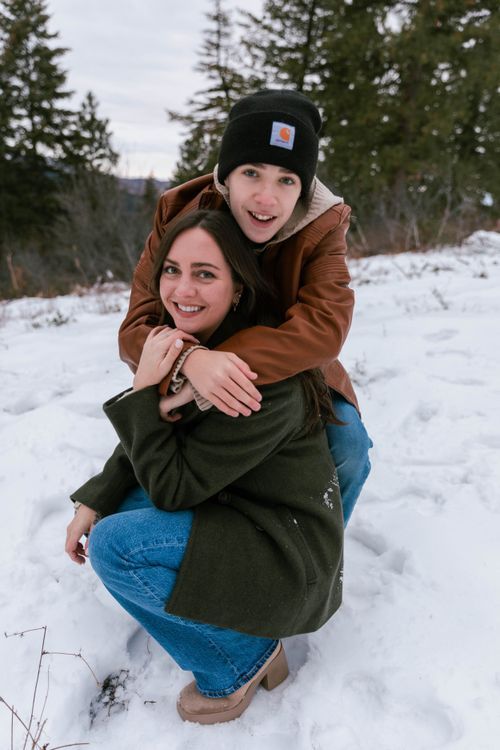 A piggyback ride in the snow